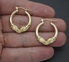 Wear your golden beauty proudly with these breathtakingly elegant 10K Yellow Solid Gold 28.1mm Shiny Hollow Rams Head Hoop Earrings! Expertly crafted, these 28.1mm hoops are the perfect size to make a stunning statement. Plus, for a special touch, they boast a stylish Rams head design. Showcase your style with these stunning 2.2g earrings! Specifications: Metal: Real 10K Yellow Gold (Stamped, 10K) Condition: Brand New Polished: Shiny Gold Weight: 2.2 grams Length: 28.1mm Metal Details Type - 10k solid gold Hoop Ear Rings, Jewelry Hoop Earrings, Rams Head, Ram Head, Solid Gold Earrings, Head Design, Creative Jewelry, Cuff Earrings, Stylish Jewelry