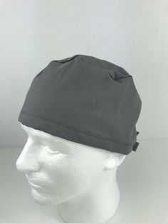 Simple, streamlined, and comfortable Skull Cap design! This classic style accommodates short to medium length of hair. Made out of 100% cotton. Cap size is standard. Cap has an elastic on the back for size adjustment Foldable trim allows for depth adjustment. Length Of Hair, Drip Dry, Cap Design, Skull Cap, Charcoal Grey, Medium Length, Making Out, Different Styles, Hand Sewing