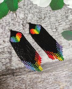 Beautiful black earrings with multi-colored hearts. Made from Czech beads Silver clasp Length 4.8 inches (12cm) Width 1.2 inches (3 cm) Heart Beaded Earrings, Pride Earrings, Seed Bead Jewelry Patterns, Beaded Jewelry Earrings, Beaded Earrings Native, Native American Earrings, Jewelry Making Earrings, Beaded Jewlery, Resin Ideas