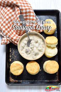 sausage gravy with biscuits on a baking tray