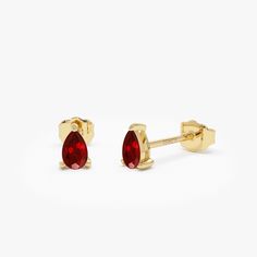 Experience sophistication with our Ruby Teardrop Studs, meticulously fashioned from 14K solid gold. These pear-shaped ruby earrings offer minimalist elegance, perfect for honoring the July birthstone or enhancing any ensemble with a touch of allure. An excellent option for a delicate birthday present, these earrings emanate enduring grace and refinement. Features: * Made to Order * Gold Kt: 14K Solid Gold (also available in 18K) * Available Gold Colors: Yellow Gold, White Gold * Pear Shape Ruby: Ruby Stud Earrings, Ruby Earrings Studs, Gold Armband, Birthstone Earrings, Gold Colors, Ruby Earrings, Ruby Jewelry, Birthstone Earring, Earrings Minimalist