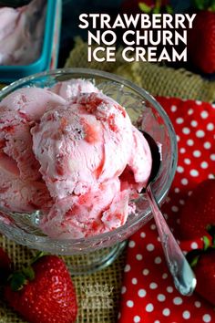 strawberry ice cream in a glass bowl with strawberries