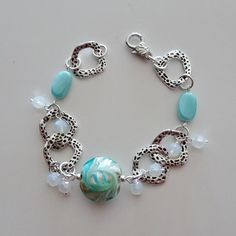 Aqua Bead Bracelet-Silver Linked Bracelet-Beach-Glass Bead Turquoise Bracelet With Silver Beads, Turquoise Faceted Beads Bracelets For Beach, Elegant Turquoise Bracelets For Beach, Silver Beaded Jewelry For Beach, Elegant Faceted Beads Bracelets For Beach, Adjustable Turquoise Metal Charm Bracelet, Turquoise Beaded Charm Bracelet With Round Beads, Turquoise Metal Beaded Bracelets For Jewelry Making, Silver Metal Beaded Bracelet For Beach