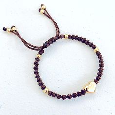 New. Stainless Steel Puffed Heart Ajustable Knotted Bracelet. Color Maroon. Handmade With 6mm Golden Stainless Steel Beads Enclosed With Knots On A Braided Cord Creating A Stylish Design. A Focal Stainless Steel Puffed Heart Is The Star Of This Bracelet. Adjustable With Macrame Sliding Closure. Wear It Alone Or Create Stacks Combinations With More Bracelets. Perfect Gift For Valentines Day, Mother’s Day, Christmas, Birthdays, Anniversaries Or Simply For Yourself. Adjustable Braided Bracelet With Sliding Knot For Valentine's Day, Adjustable Heart Bracelet With Sliding Knot, Casual Adjustable Heart-shaped Braided Bracelets, Adjustable Brown Jewelry With Heart Charm, Adjustable Braided Bracelet With Heart Charm, Adjustable Heart Shaped Brown Bracelet, Adjustable Heart-shaped Brown Bracelet, Adjustable Brown Heart-shaped Bracelet, Brown Adjustable Heart Bracelet