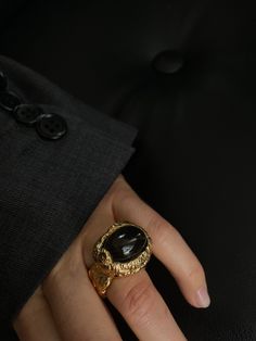 Elevate your jewelry collection with our exquisite 24k gold plated massive exceptional statement handmade coctail ring with onyx. Each detail has been carefully considered and expertly crafted by hand to create a truly stunning piece of jewelry. The ring's centerpiece is a large, bold onyx stone that radiates elegance and sophistication. Onyx is known for its unique properties, believed to provide strength and support during challenging times. Combined with the lustrous 24k gold plating, this ring is a beautiful contrast of rich hues that will complement any skin tone. Wear this ring to make a statement and turn heads at any special occasion, or simply as an everyday accessory to add a touch of glamour to any outfit. Its durable and long-lasting construction ensures that you can cherish an Luxury Handmade Onyx Jewelry, Unique Onyx Jewelry For Formal Occasions, Gold Onyx Ring Perfect As A Gift, Gold Onyx Ring As A Gift, Gold Onyx Ring Perfect For Gifts, Gold Gemstone Rings For Party, Onyx Open Ring For Formal Occasions, Luxury Gold Plated Rings For Party, Formal Onyx Open Ring Jewelry