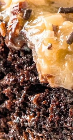 closeup of a piece of chocolate cake with caramel drizzle on top