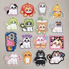 a bunch of stickers that are sitting on a table with some kind of animals