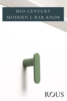 the front cover of a book with an image of a green door handle on it