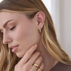 Our ear cuffs make for a perfectly modern layered look. The best part? No piercing required. The Double Ear Cuff is made from solid 14k yellow gold and measures about 7/18" in diameter. In stock earrings will ship within 3 business days Made to order earrings ship within 1 week. Need it sooner? Contact us. Details 14k gold 7/18" diameter Sold as single Shipping + Returns In stock earrings will ship within 3 business days. Made-to-order earrings will ship within 1 week. Need it sooner? Contact us Minimalist 14k Gold Huggie Ear Cuff, Modern 14k Gold Single Ear Cuff, Adjustable Gold-plated Tarnish-resistant Ear Cuff, Dainty Yellow Gold Ear Cuff For Everyday, Modern Hypoallergenic Huggie Ear Cuff, Classic 14k Gold Single Ear Cuff, Modern Huggie Ear Cuff, Modern 14k Gold Tarnish-resistant Cartilage Earrings, Modern Yellow Gold Ear Cuff For Everyday