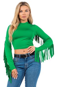 Unveil your flair for the dramatic with our Long Sleeve Round Neck Stretch Crop Top with Fringe Back. This top is the epitome of bold sophistication, designed to offer both comfort and standout style. The classic round neck and long sleeves create a sleek silhouette, while the stretchable fabric ensures a body-hugging fit that accentuates your shape. It's the fringe back detail that truly sets this piece apart, adding a playful yet elegant charm to your every movement. Whether it's a night out w Fitted Fringe Top For Party, Fitted Party Tops With Fringe, Club Top With Fringe, Fringe Tops For Fall Party, Fall Party Tops With Fringe, Fall Party Tops With Fringe Details, Evening Fringe Tops For Fall, Fitted Long Sleeve Top With Fringe, Fitted Fringe Tops For Evening