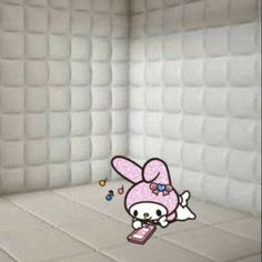 an image of a cartoon character on a cell phone in a room with white walls