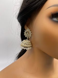 We bring beautiful Jewelry sure to elevate any look! Kindly pay attention to all photos and video and ask questions about the item prior to ordering. Bollywood Style Pearl Bridal Earrings For Festive Occasions, Elegant Pearl Chandbali Bridal Earrings With Tilla, Bollywood Kundan Jhumkas With Dangling Beads, Bollywood Style Kundan Jhumkas With Dangling Beads, Festive Pearl Chandbali Danglers, Bollywood Chandbali Pearl Bridal Earrings, Pearl Earrings With Stone Work For Wedding, Elegant Beaded Drop Earrings, Wedding Pearl Earrings With Stone Work