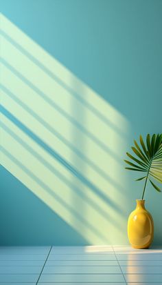 a yellow vase with a green plant in it on a tile floor next to a blue wall