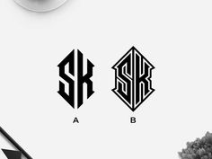 two letters are shown in black and white, one is the letter s and the other is