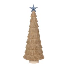 a straw christmas tree with a star on top