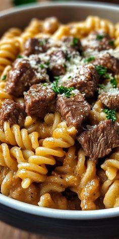 Beef and Rotini in Garlic Parmesan Sauce is a creamy, savory dish that's perfect for busy nights. Made with ground beef, rotini pasta, garlic, and a rich parmesan sauce, this meal is both filling and delicious. It's easy to prepare, customizable with different ingredients, and a great choice for family dinners.