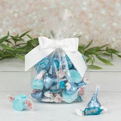 a bag filled with blue and white candies