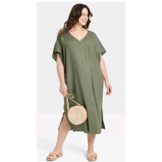 Relaxed Oversized Linen Dress New Casual Oversized Dresses With Batwing Sleeves, Casual Summer Dresses With Batwing Sleeves, Casual Oversized Beach Midi Dress, Casual Oversized Midi Dress For Beach, Oversized Short Sleeve Midi Dress For The Beach, Oversized V-neck Midi Dress For Beach, Casual Batwing Sleeve Beach Dress, Spring Casual Maxi Dress With Batwing Sleeve, Casual Spring Maxi Dress With Batwing Sleeves