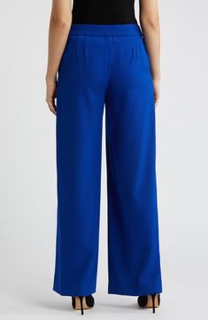 A sweeping wide leg adds casual grace to these staple pants that move from desk to dinner with ease. 31" inseam; 24 1/2" leg opening; 11" front rise; 15 1/2" back rise Zip fly with hook-and-bar closure 96% polyester, 4% elastane Dry clean Imported Blue Stretch Wide Leg Full Length Pants, Luxury Blue Full Length Wide Leg Pants, Tailored Wide-leg Blue Dress Pants, Non-stretch Denim Blue Wide Leg Pants, Blue Stretch Full-length Wide Leg Pants, Men Home Decor, Hairstyling Products, Rollerball Perfume, Fragrance Design