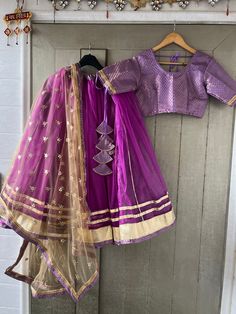 Custom made beautifull costume with double layers skirt of brocade and net The combo includes  - 8 meter flare lehenga - custom made blouse - 2.5 meters dupatta/scarf - belt  connect with us before placing the order +91 7737288355 to discuss measurements  It comes with golden tassels, dupatta of your choice and blouse  Discuss with our designers about your dancing dress +91 7737288355  Negotiation on price as per quantity.  Bollywood dance costume- Kalbelia dance costume- Indian dance - Pakistani dance - wedding costume - dance - ghoomar - Tera tali dance Party Net Choli With Cutdana, Party Net Choli With Cutdana Details, Transitional Lehenga With Pallu In Organza, Bollywood Style Anarkali Set With Pallu, Traditional Purple Sharara With Gota Work, Lehenga With Pallu In Organza, Fitted Net Choli With Cutdana, Traditional Purple Sharara With Drape, Traditional Purple Sharara With Traditional Drape