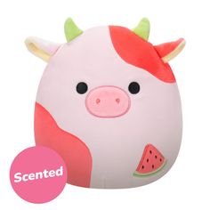 a stuffed animal with horns and watermelon on it's face