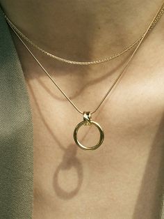 Editor's NotesFEYSE's necklace is cute and perfect for daily wear.- Light-weighted- Eye-catching ring pendant detail- Adjustable closure- Perfect for layering- Casual and unique wear- Feminine and minimal style*18k gold is for additional chargeMeasurements(in.)- Size: 16.92in. (+1.97in. adjustable)- Pendant: 0.75in. (W) / 0.94in. (L)Composition & Care- 925 sterling silver (18k gold plated)- Avoid heat and moisture- Professional cleaning is recommendedDesigner- by FEYSE Minimalist Round Pendant Jewelry For Layering, Yellow Gold Round Pendant Jewelry For Layering, Hoop Jewelry With Adjustable Chain For Everyday, Everyday Hoop Jewelry With Adjustable Chain, Everyday Sterling Silver Hoop Necklaces, Tarnish Resistant Hoop Necklace, Everyday 14k Gold Full Circle Jewelry, Everyday Full Circle 14k Gold Jewelry, Detachable Round Pendant Chain Necklace