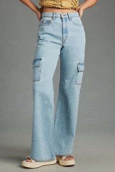 100% cotton Five-pocket styling Side cargo pockets Front zip Machine wash Imported | Jolene Cargo High-Rise Wide-Leg Jeans by Unpublished in Blue, Women's, Size: 32, Cotton at Anthropologie Light Wash Cotton Cargo Jeans With Multiple Pockets, Medium Wash Cotton Cargo Pants With Multiple Pockets, Relaxed Fit Light Wash Cargo Jeans With Pockets, Medium Wash Cotton Cargo Pants With Side Pockets, Medium Wash Cotton Cargo Jeans With Patch Pockets, Light Wash Utility Cargo Jeans With Hip Pockets, Cotton Medium Wash Cargo Jeans With Patch Pockets, Cotton Cargo Jeans With Patch Pockets In Medium Wash, Medium Wash Cotton Cargo Pants With Patch Pockets