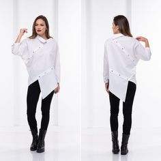 Extravagant Shirt, White Shirt, Asymmetrical ShirtThis extravagant shirt has one regular sleeve and one batwing sleeve. Asymmetrical buttons front & back along with the super chic and different collar style turn this model into a fabulous designer piece for your personal street style wear.The model in the picture is 168cm. ⅼ 5.6 ft. tall and is wearing size S / color: White🌟 INFO:• Worldwide EXPRESS shipping – please provide a phone number for shipping documents• US Sizing XS to 4XL – body Street Style Wear, Shipping Documents, Linen Tunic Shirt, Batwing Shirt, Futuristic Clothing, Oversized White Shirt, White Shirt Outfits, Asymmetrical Shirt, Linen Top Women