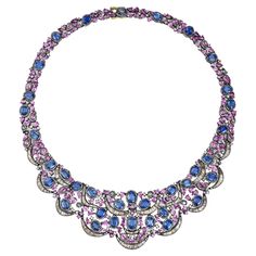 Unveil the epitome of luxury with our Victorian 82 Cttw. Kyanite, Pink Sapphire, and Diamond Choker Necklace. This opulent piece is a masterpiece of craftsmanship and design, blending the classic elegance of Victorian aesthetics with modern sophistication. Resembling a floral garland, the necklace features a harmonious arrangement of curvy and wavy baguette diamond frames that gracefully hold stunning oval kyanites encased in diamond halos. The interplay of the deep blue kyanites with the vibrant hues of pear and oval pink sapphires creates a captivating visual symphony, further enhanced by the sparkle of pear diamonds set in black prongs. Crafted with precision, the necklace boasts a total metal weight of 54 grams, seamlessly combining the robustness of 925 sterling silver with the luxury Victorian Aesthetics, Diamond Choker Necklace, Jewelry Design Drawing, Diamond Choker, Floral Garland, Pear Diamond, Gems Jewelry, Baguette Diamond, Dream Jewelry