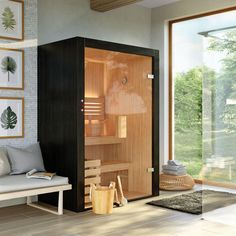 a sauna in a living room next to a window