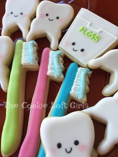 decorated cookies with toothbrushes and dental floss