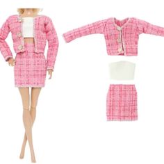 a barbie doll wearing a pink suit and skirt