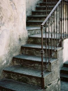 a set of stairs leading up to an old building