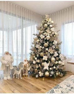 a decorated christmas tree in a living room