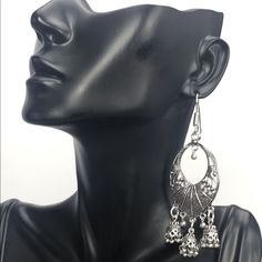 These Faulty And Feminine Oxidized Silver Plated Dangling Earring Are Exquisite And Elegant. Can’t Be Paired With Any Style Of Attire To Bring A Soft And Flirty Feel! The Mini Chandeliers At The Base Of These Danglers Do Chime Softly With Movement Making Them Extra Whimsical And Charming. Because We Know Each Person Has A Unique Neck Length And Face Shape Here Are The Measurements To These Beauties. Length From Fish Hook To Tip Of The Chandelier Bell Is 3.3 Inches Width Is 1.2 Inches Mini Chandeliers, Mini Chandelier, Dangling Earrings, Oxidized Silver, Face Shape, Fish Hook, Face Shapes, Chandeliers, Silver Plated