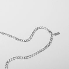 This classic chunky chain with a closed circle detail gives the most chic and timeless look. Pair with any of our clasped charms within the circle. 18" long with 2” extender - This jewelry is waterproof, built to keep up with your everyday life. Whether you're showering, working out, or swimming, it won't fade. Classic Silver Cuban Link Chain Necklace, Everyday Curb Chain Charm Necklace, Trendy Silver Charm Necklace For Everyday, Classic Stainless Steel Link Necklace, Silver Everyday Curb Chain Jewelry, Silver Curb Chain Jewelry For Everyday, Everyday Silver Curb Chain Jewelry, Sterling Silver Curb Chain Necklace For Everyday, Everyday Jewelry With Curb Chain Links