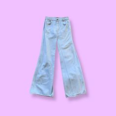 "Super cute Disco Jeans!! 100% Cotton Jeans! Super cute light-wash. Bell-bottoms.  Measurements:  Waist: 28\" Hips: 37\" Rise: 11\" Thigh: 8.5\" Inseam: 34\" Leg Opening: 22\" Condition: small pink dot stain on front, smaller than penny size. and staining on pocket but very light" Trendy Light Wash Flare Pants, Casual Light Blue Cotton Flare Jeans, Spring Light Wash High Rise Flare Jeans, Vintage Relaxed Fit Flare Jeans For Spring, Vintage Spring Flare Jeans In Relaxed Fit, Trendy Light Wash Flare Bottoms, Spring Vintage Flare Jeans With Relaxed Fit, Spring Vintage Relaxed Fit Flare Jeans, Casual Light Wash Flare Jeans For Spring