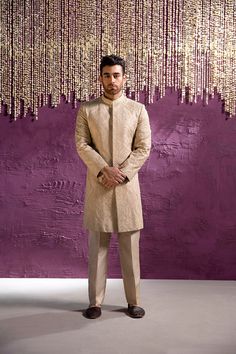 Buy Royal Embroidered Beige Sherwani Pakistani Groom Dress a stunning attire adorned with luxury designs and fine details. The Sherwani is available Online Fitted Jamawar Bandhgala For Reception, Beige Sherwani Groom, Unstitched Bollywood Traditional Wear For Ceremony, Unstitched Traditional Wear For Ceremony, Fitted Traditional Wear With Chikankari Embroidery For Wedding, Traditional Fitted Sherwani For Reception, Fitted Traditional Sherwani For Reception, Fitted Chikankari Traditional Wear For Wedding, Fitted Kurta With Chikankari Embroidery For Ceremony