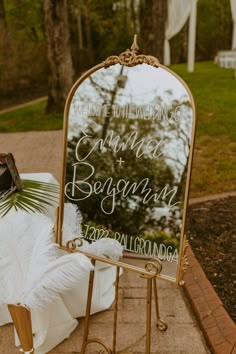 a sign that says welcome to the bride and groom in front of a large mirror