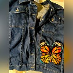 Women’s Hand Embroidered Denim Jacket. Xl Blue Embroidered Denim Vest, Multicolor Embroidered Denim Jacket With Pockets, Denim Jacket With Multicolor Embroidery And Pockets, Casual Denim Jacket With Multicolor Embroidery And Pockets, Embroidered Denim Blue Jacket For Fall, Embroidered Denim Jacket For Fall, Blue Denim Jacket With Embroidered Patch For Spring, Blue Denim Jacket With Embroidered Patch For Fall, Spring Blue Denim Jacket With Embroidered Patch