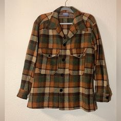 Vintage 1970’s Rare Pendleton Woolen Mills Portland, Or 100% Virgin Wool Sz Xl Brown, Green, Tan Plaid Shacket/ Over Coat Super Rare Vintage Over Coat/ Wool Plaid Jacket Made In The Usa Fabulous Christmas Gift For The Special Lady In Your Life! Tag Says Warranted To Be A Pendleton Trade Mark Reg.Us.Pat.Off. Size: Vintage Runs Small So This Will Likely Fit A Womens Xl Or Mens Large Better Can Be Worn Oversized By Any Smaller Size Too! Thick Warm Cozy Heavy Duty This Weights Quite A Few Lbs Materi Green Plaid Jacket, Warm Tone Colors, Character Details, Over Coat, Pendleton Jacket, Pendleton Woolen Mills, Plaid Shacket, Trade Mark, Fabulous Christmas