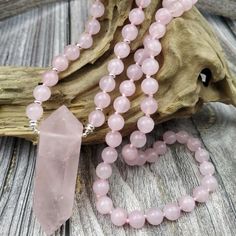 Our Natural Rose Quartz Bead Necklace is a gentle and beautiful piece of vintage spiritual jewelry with mala beads. The lovely pink quartz necklace restores trust and harmony in relationships while encouraging unconditional love. Rose Quartz crystal and rose quartz jewelry promote love, self-love, and friendship. Healing Rose Quartz Round Bead Necklace, Spiritual Rose Quartz Beaded Necklaces For Healing, Spiritual Healing Rose Quartz Beaded Necklaces, Pink Spiritual Gemstone Crystal Necklace, Pink Spiritual Crystal Gemstone Necklace, Spiritual Pink Gemstone Crystal Necklace, Spiritual Gemstone Beads Jewelry For Valentine's Day, Rose Quartz Beaded Necklaces With Gemstone For Gift, Rose Quartz Necklace With Gemstone Beads For Meditation