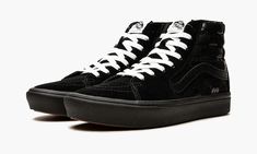 The Vans ComfyCush Sk8-Hi "Cold Hearted" reinvigorates the high-top skateboarding shoe with an all-over skull-and-heart print.  Featuring a co-molded construction of foam and rubber, the black and white sneaker receives a perfect combination of both comfort and grip.  The PopCush footbed is meticulously tuned for impact protection, superior cushioning, and custom energy return.  Staying true to its roots, a waffle rubber outsole supports the shoe underfoot.  This Vans Sk8-Hi dons a triple black Cold Hearted, Black And White Sneakers, Vans Sk8 Hi, Stadium Goods, Vans High Top Sneaker, Sk8 Hi, Triple Black, Cool Jackets, Vans Sk8