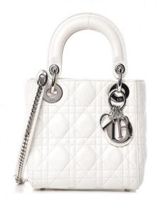 Description Mini Lady Dior bag with chain in white lambskin, jewelry in light gold-tone metal. Long-chain. Size: 6.7 x 5.9 x 2.8 inches / 17 x 15 x 7 cm 100% genuine materials, matching the quality of the Dior product; Mini Lady Dior bag with chain in white lambskin Cannage topstitching Long detachable chain Jewelry in light gold-tone metal Carried in the hand, on the shoulder or across the body Comes with dust bag and ations Our: The product is otherwise ! Dior Mini Bag, Lady Dior Mini, Mini Lady Dior, Saint Laurent Handbags, Book Tote Bag, Dior Logo, Handbag Outlet, Classic Chic, Small Handbags