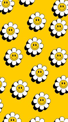 a yellow background with white flowers and smiley face drawn on the petals in black and white