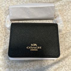 Black Coach Wallet On A Chain Perfect Size And Can Be Worn As A Night Out Little Purse Chic Black Bifold Coin Purse, Classic Coach Coin Purse Gift, Classic Coach Coin Purse As Gift, Coach Black Coin Purse For Everyday, Black Coach Coin Purse, Classic Black Coin Purse As Gift, Compact Black Card Holder As Gift, Compact Black Card Holder Gift, Black Bifold Card Holder For Evening