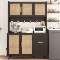 a kitchen with brown cabinets and wicker baskets on the top shelf next to a microwave