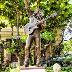 a statue of a man with a guitar