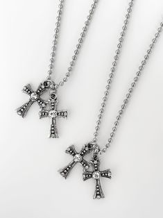 Introducing your new favorite layer - the 'VENEZIA' cross chain. Featuring stunning cross pendants cascaded in CZ gemstones and a stainless steel ball chain, this piece will easily become a daily essential in your jewelry collection. Wear the 'VENEZIA' on its own, or pair with our 'SAINT' pearl necklace for a stacked look! Made with stainless steel ball chain and zinc alloy pendant. Available in lengths 16", 18", 20", 22". Model is wearing 18". Handmade in Los Angeles. Cross Chain Necklace, Cross Chain, Cross Jewelry, Ball Chain, Cross Pendant, Zinc Alloy, How To Introduce Yourself, Style Guides, Cross Necklace