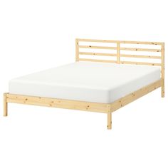 the bed frame is made with wood slats